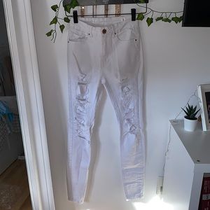 WHITE skinny distressed jeans.   2/35$